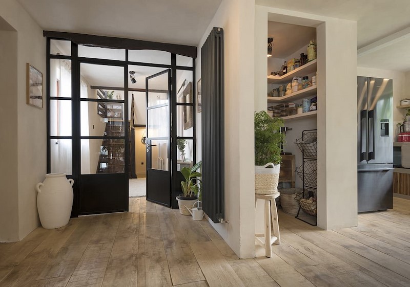 Black Internal panneled door with desk in foreground