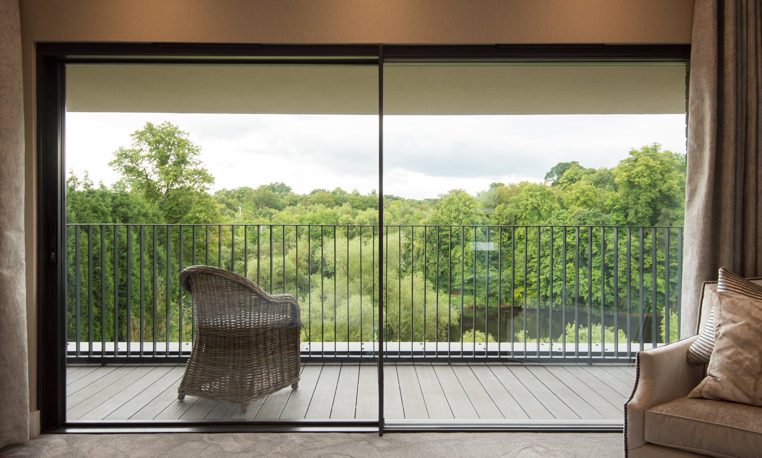 Origin sliding doors leading out to a balcony