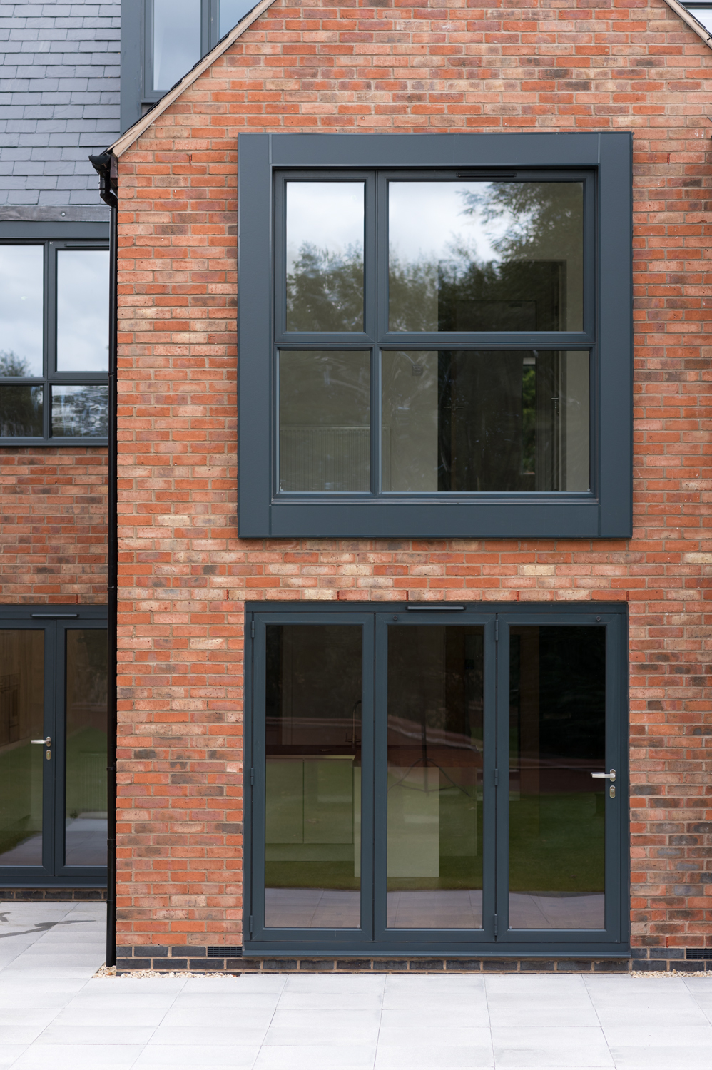 Origin bifold doors below Origin windows