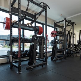 Two sets of workout racks looking through Origin windows