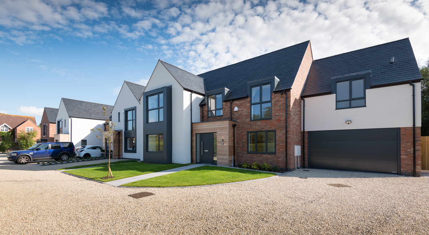 Modern housing from the front with the sun shining