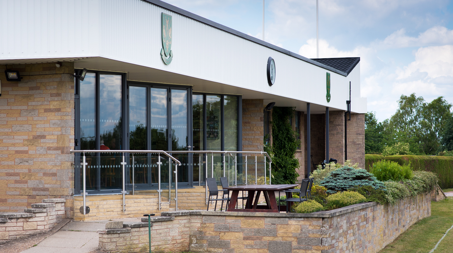 Wide view of a golf club fitted with Origin bifold doors