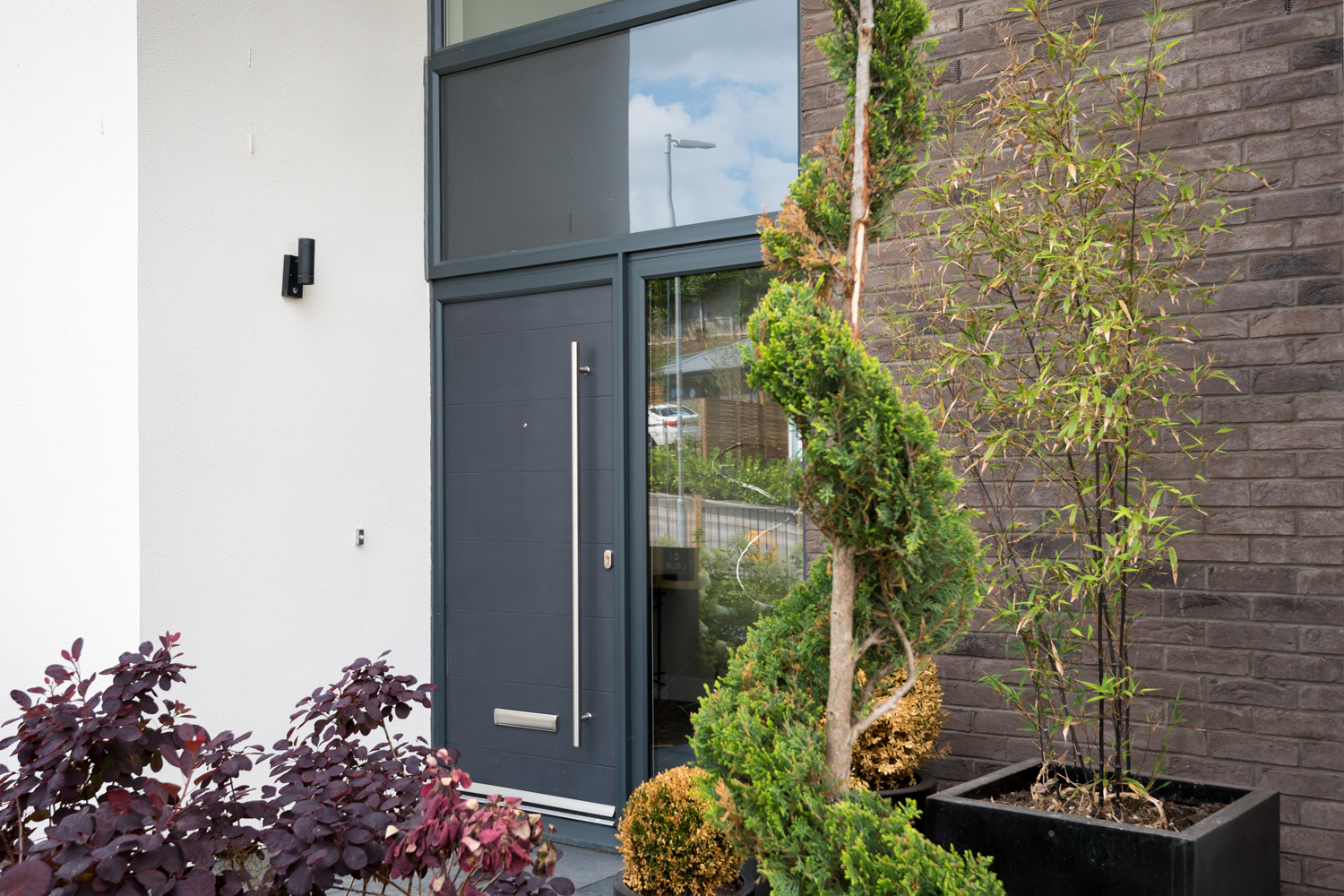 Origin front door on the front a modern house