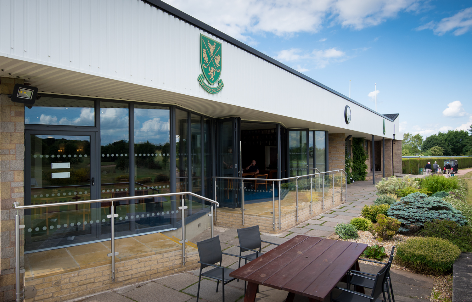 Oudoor view of the golf club fitted with Origin bifolds