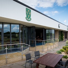 Oudoor view of the golf club fitted with Origin bifolds