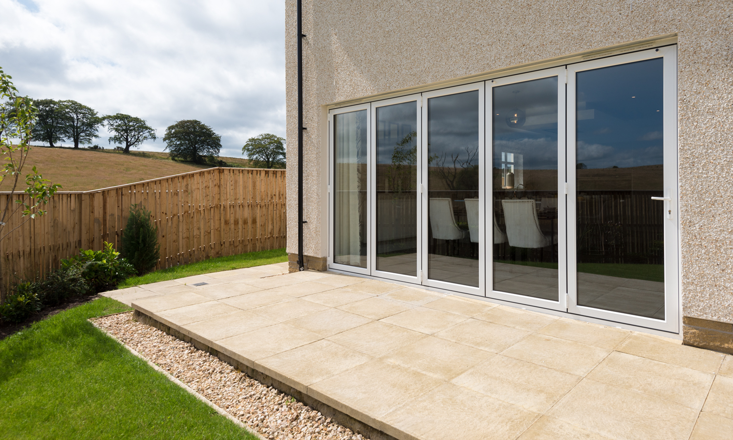 Closed bifold doors from the view of the garden